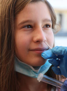 Little,Girls,Doing,A,Nasopharyngeal,Swab,For,Coronavirus,Research,With