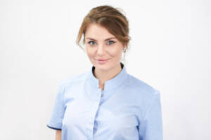 Happy,Successful,Young,Woman,Cosmetologist,On,The,Background,Of,The