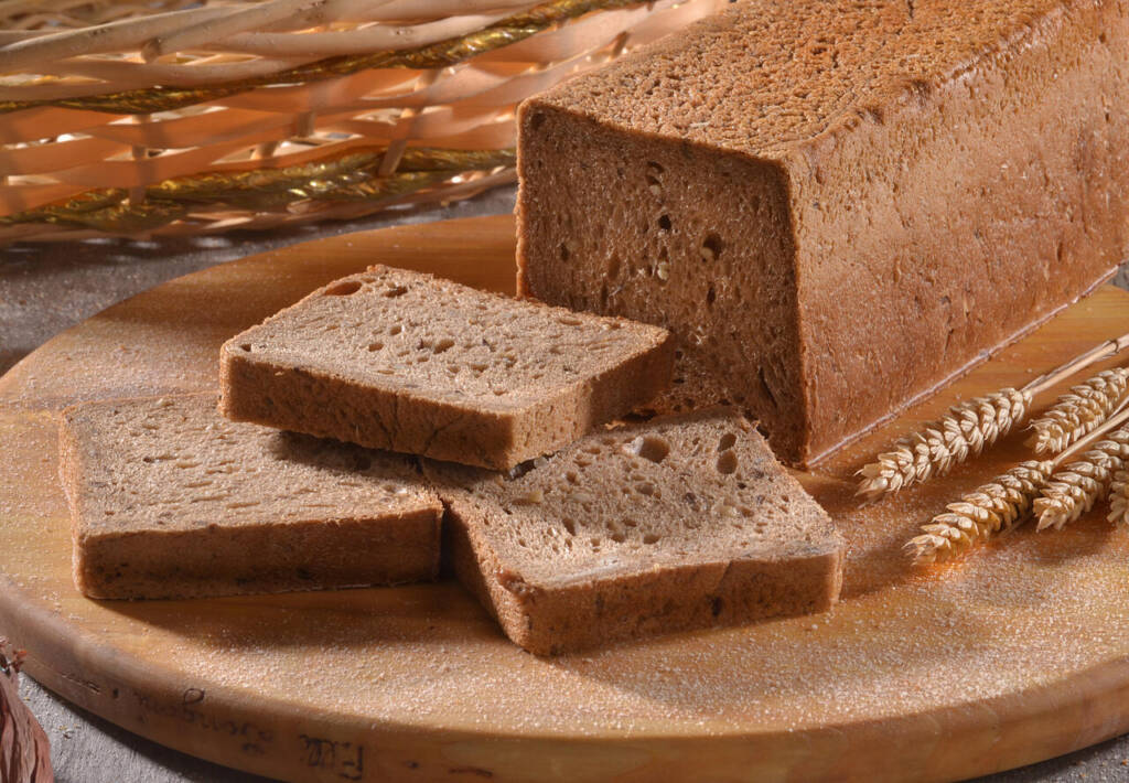 Toast,Wheat,Integral,Bread,Sliced,On,Rustic,Background.