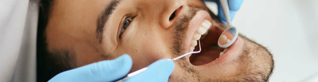 Patient male at dentist